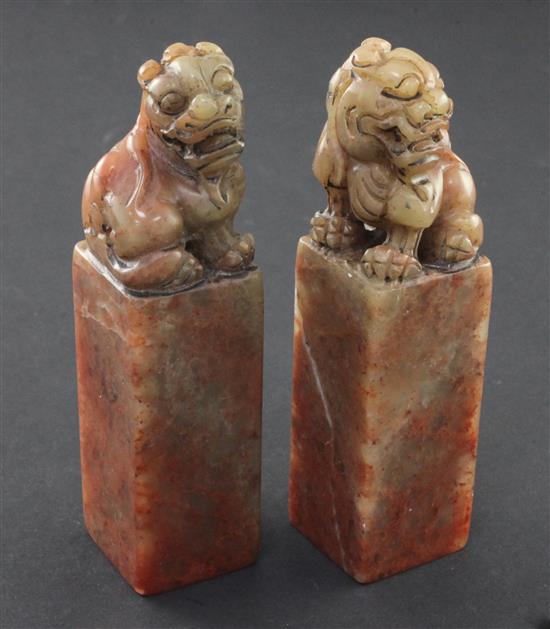 A pair of Chinese soapstone lion-dog seals, 11.5cm, with box